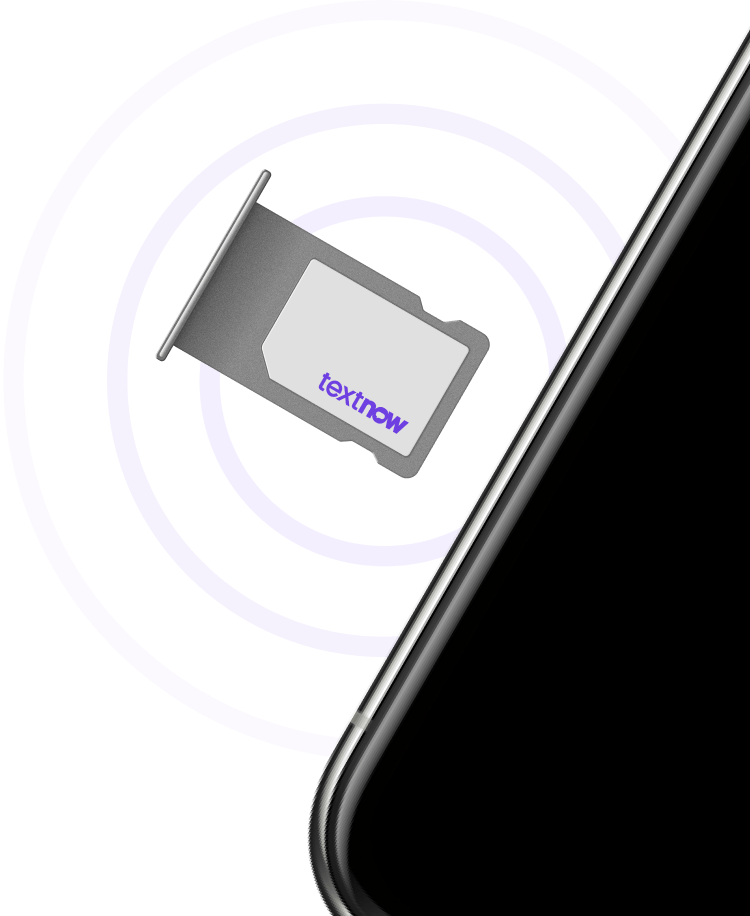 A SIM card being inserted in a phone.